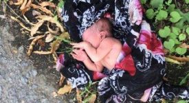 thailandia-bimba-abbandonata-in-strada-salvata-da-un-passante