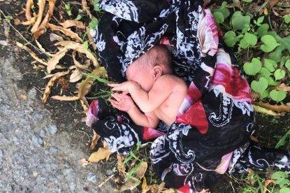 thailandia-bimba-abbandonata-in-strada-salvata-da-un-passante